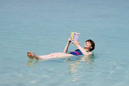 Susan floating on the Dead Sea
