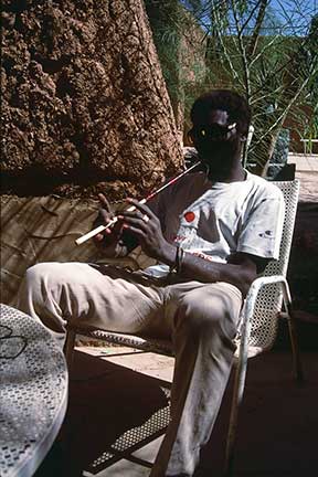 Ishmael playing Fulani instrument