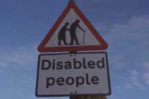 Sign:  Disabled people crossing